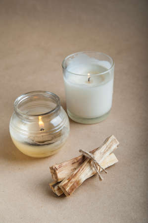 Palo Santo bars close-up and copy space. Ritual cleansing with sacred ibiocai, meditation, aromatherapy with incense and candles.の写真素材