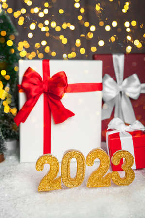 Happy new year 2023 background. New year holidays and christmas card invitation with bright lights,...