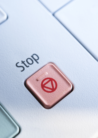 Red Stop button on a copy machineの写真素材