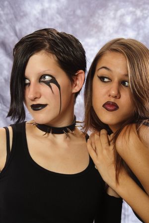 Friends Stick Together.  Two goth girls looking to the left.の写真素材