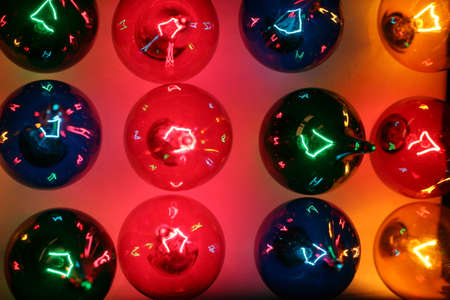 Rows of colored lights reflect off of one another.の写真素材