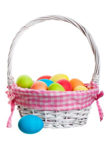 An Easter Basket full of freshly dyed eggs. Shot on white background.の写真素材