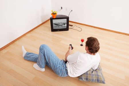 A middle-aged, newly divorced man, with little possessions in a new apartment, after his wife got...