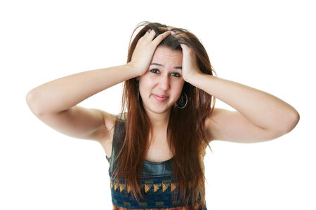 A sad and stressed mixed race college student.  Shot on white background.の写真素材