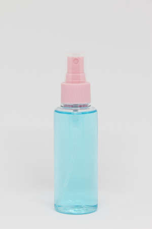 alcohol spray on white backgroundの写真素材