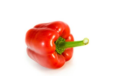 RED BELL PEPPER ON WHITE BACKGROUNDの写真素材