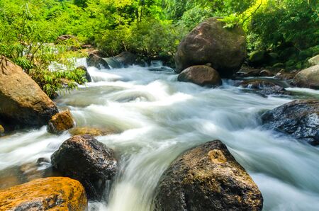 waterfall and stone in natureの写真素材