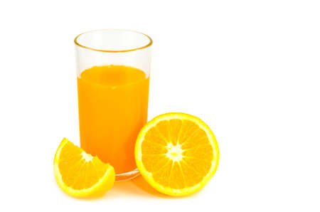 half orange and orange juice in glassの写真素材