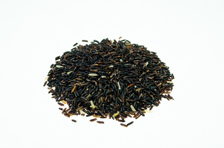 Group of black Rice berry on white backgroundの写真素材