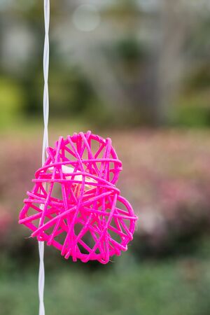 Led lights in the form of pink heart-shaped backgroundの写真素材