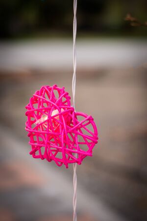 Led lights in the form of pink heart-shaped backgroundの写真素材