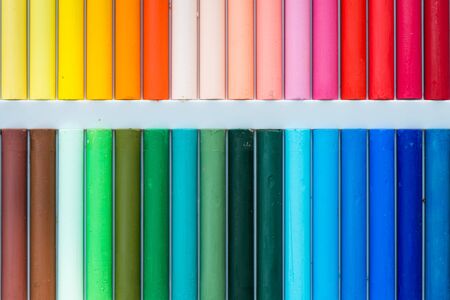 Colorful oil pastels in a box, close up, macro, full frameの写真素材