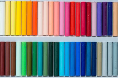 Colorful oil pastels in a box, close up, macro, full frameの写真素材