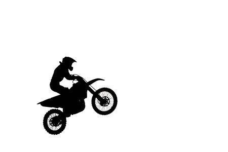 Silhouette of an extreme driver of a motocross, high jump during training motocrossの写真素材