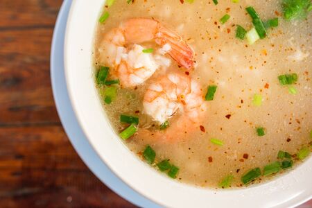 Thai congee with shrimp for breakfastの写真素材