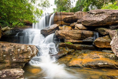 Landscape of peaceful waterfall in the tropical rainforest, thailandの写真素材