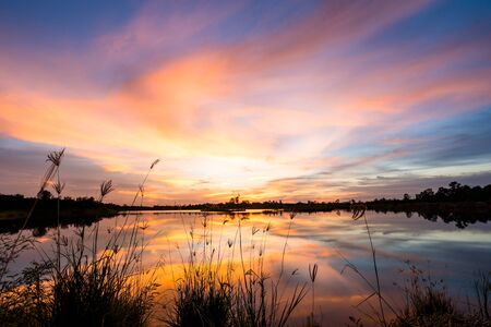 Beautiful colorful sky at sunset on the lake