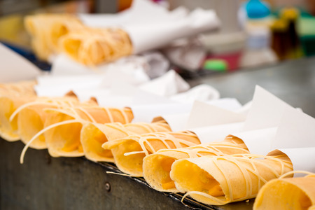 crepe on street food, prepared or cooked food sold by vendors in a street or other public location