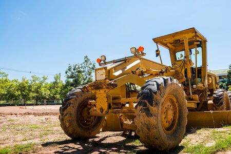 Motor grader staying on the site workの写真素材