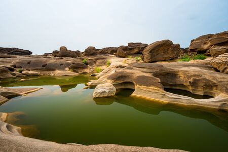 Amazing of rocks, Natural of rock canyon in mekhong river in summer, Three thousand hole, Ubon Ratchathani province, North east Thailandの写真素材