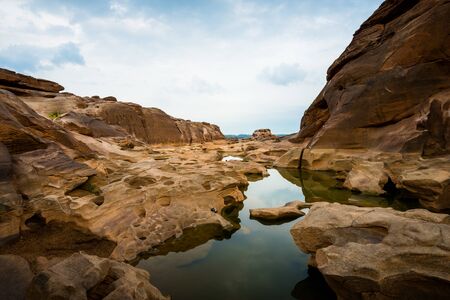 Amazing of rocks, Natural of rock canyon in mekhong river in summer, Three thousand hole, Ubon Ratchathani province, North east Thailandの写真素材