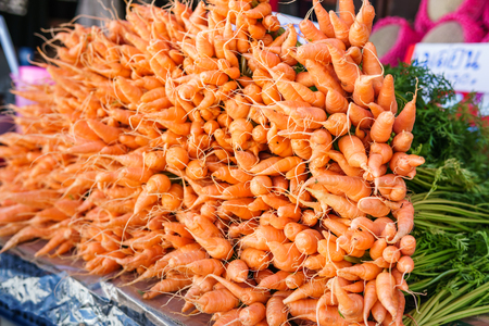 Baby carrots for sell in street market by hill tribe community on in Phu Tubberk Phetchabun Province, Thailandの写真素材