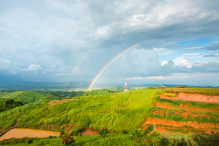 Landscape of hill from the top of mountain with Rainbowの写真素材