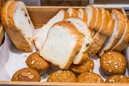 Assortment of freshly baked bread, Varieties of bread Sliced ready for breakfastの写真素材