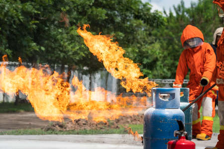 Firefighters are demonstrating fire fightingの写真素材