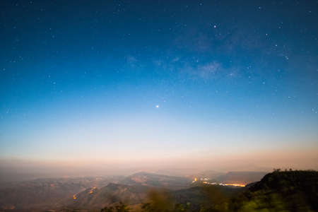 Landscape with milky way galaxy, Night sky with stars and silhouette of tree