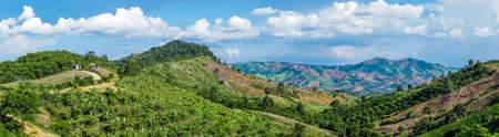 Aerial view, Panorama landscape of tree, mountain from the top of mountain on blue sky with cloud