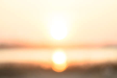 Orange color sky with big sun on sunset use for background, blurred