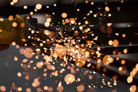 The sparks made by a mechanic grinding iron.
