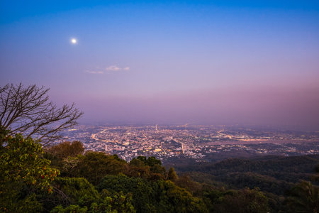 Aerial view, landscape of city at night with electric light and air pollution, Chiang Mai City at night, Thailandの写真素材