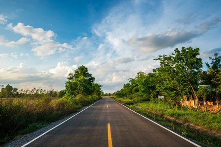 Empty country road with beautiful skyの写真素材