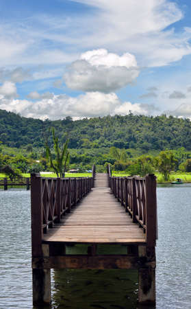 wooden bridge over the lakeの写真素材