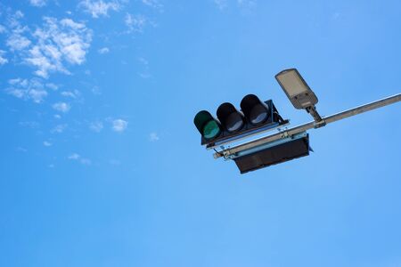 Traffic lights of land traffic and blue sky backgroundの写真素材