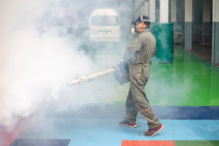 Fogging to eliminate mosquito in the room for preventing the spread of dengue feverの写真素材