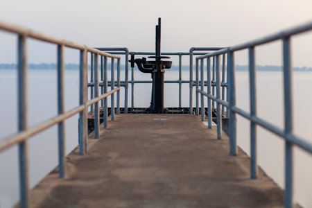 The walkway opens and closes the dam's water gate.の写真素材