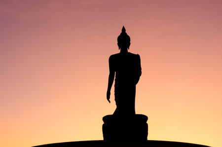 buddha statue isolated with sunset.の写真素材