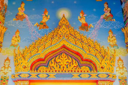 Painting on roof in Thai temple, Thailand.の写真素材