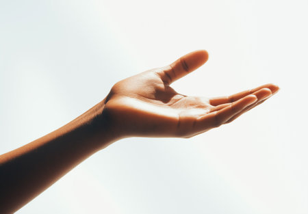 Close-up of female hand gesturing with fingers against white backgroundの素材