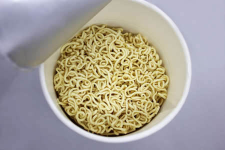 Instant noodle cup , top view, isolated on white backgroundの写真素材