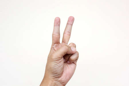 Various hand signs and symbols over a white background.