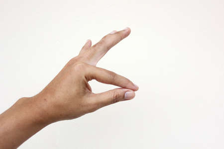 Various hand signs and symbols over a white background
