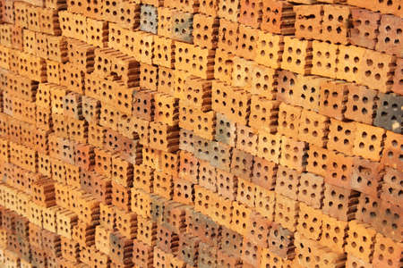 Bricks for construction,light and shadow with one brick disappear.