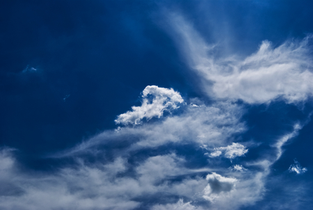 Blue sky with white clouds, background, cloudscapeの写真素材