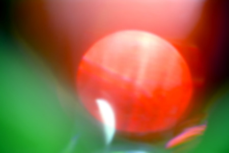 blurry Christmas background, abstract with bokeh red lightの写真素材