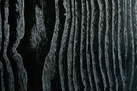 background with a beautiful veined black woodの写真素材