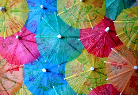 series of colored paper umbrellas for cocktails, parties, celebrationsの写真素材